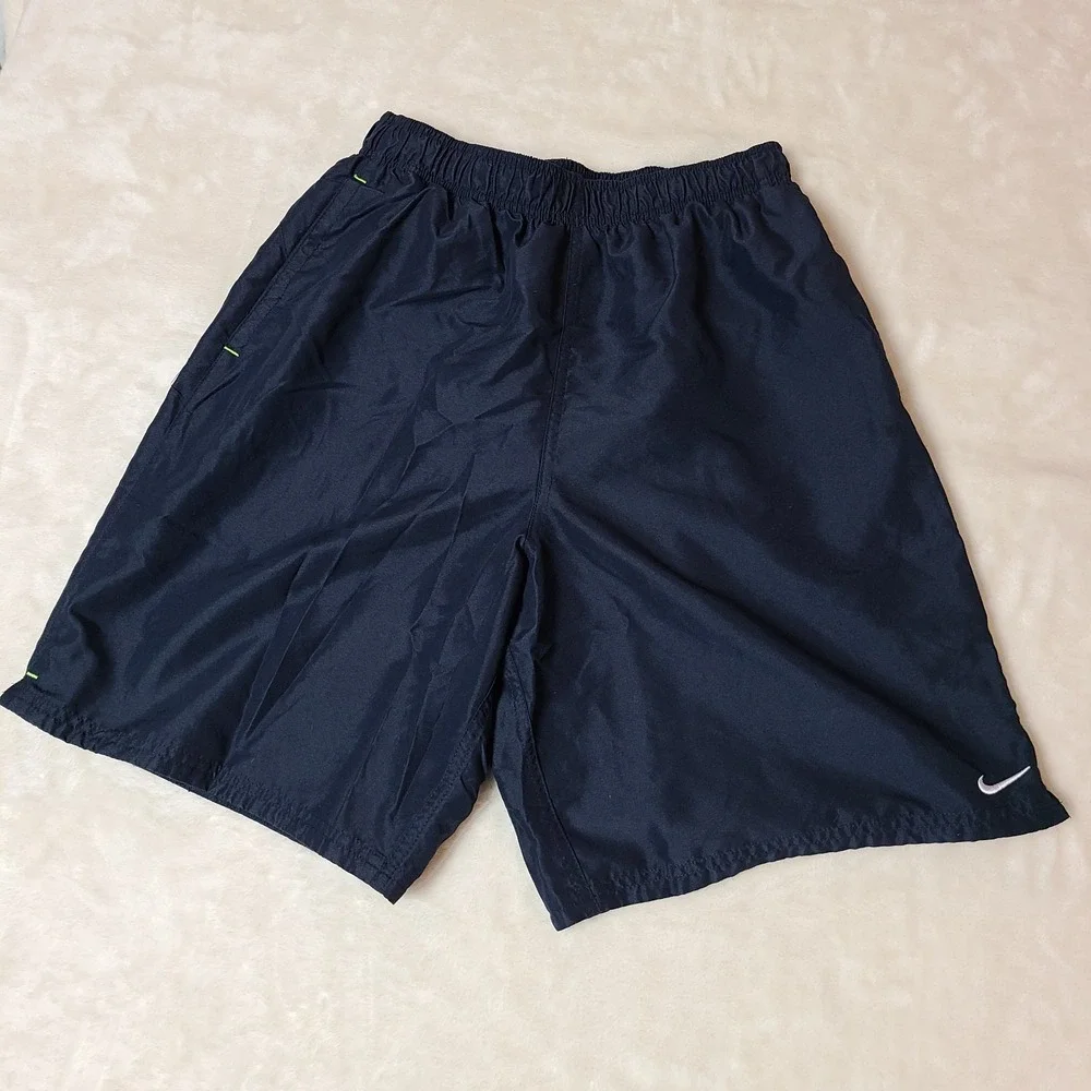 VTG NIKE gym Shorts Medium Mesh Lining Swim Trunks Swoosh Logo Pockets